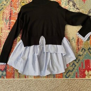 Cute knit turtleneck with asymmetrical shirt tails